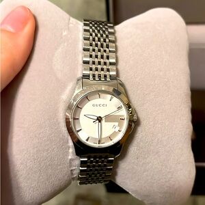 Genuine Gucci watch.